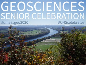 The popular scene of the Connecticut River winding its way south through farm fields towards the profile of the Holyoke Range on a clear blue-sky day with the words "GEOSCIENCES SENIOR CELEBRATION" and hashtags mentioned in tasteful white and blue text hanging in clear blue sky.