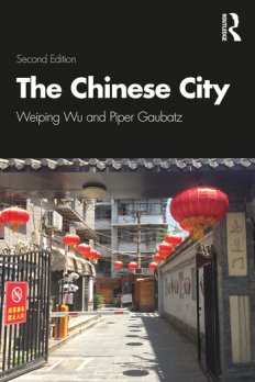 Book Cover for "The Chinese City" feturing title in white san-serif text over photograph of stone-paved courtyard festively hung with red, oblate, paper lanterns.